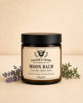 Moon Balm Lavender Tallow Balm in amber glass jar with lavender sprigs