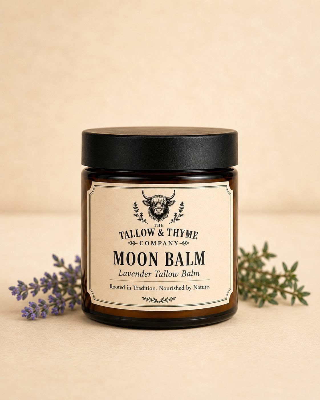Moon Balm Lavender Tallow Balm in amber glass jar with lavender sprigs